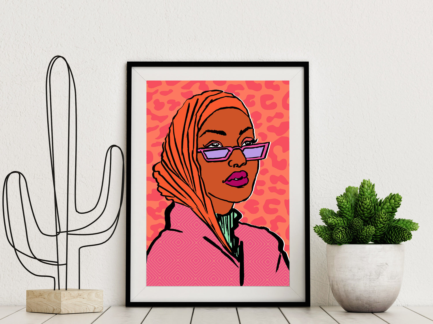 Framed art print of a Black Muslim woman wearing Hijab illustrated by DorcasCreates