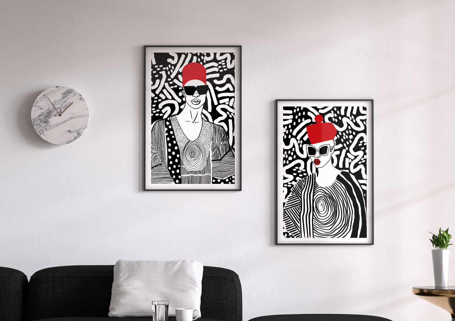 Two art prints framed in living room; illustration of african man and african woman by DorcasCreates